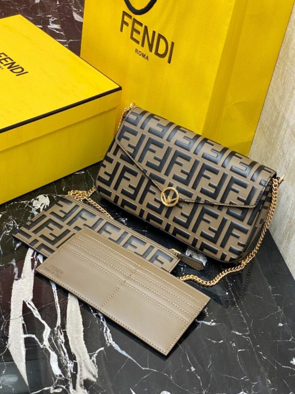 Authentic Fendi F is Fendi Brown Zucca Embossed Leather Envelope